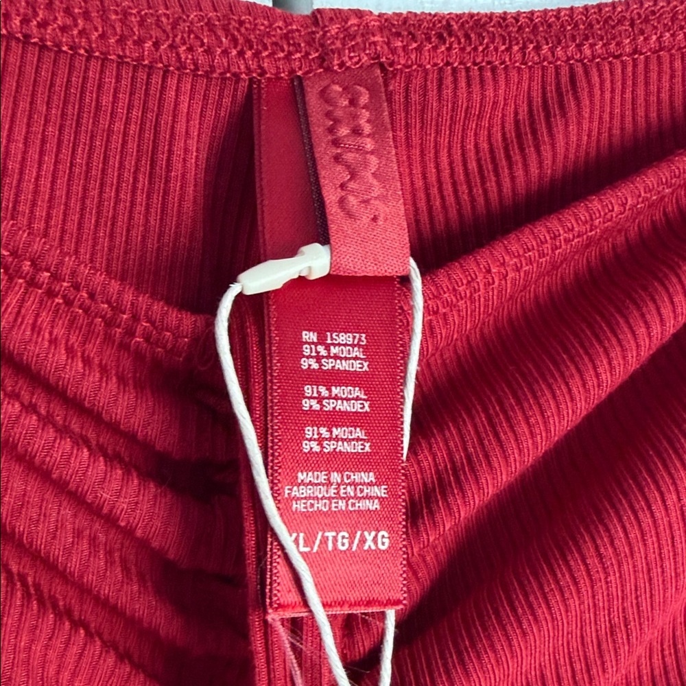 SKIMS Ribbed Drawstring Boot-Cut Pants in Deep Red - Picture 6 of 9